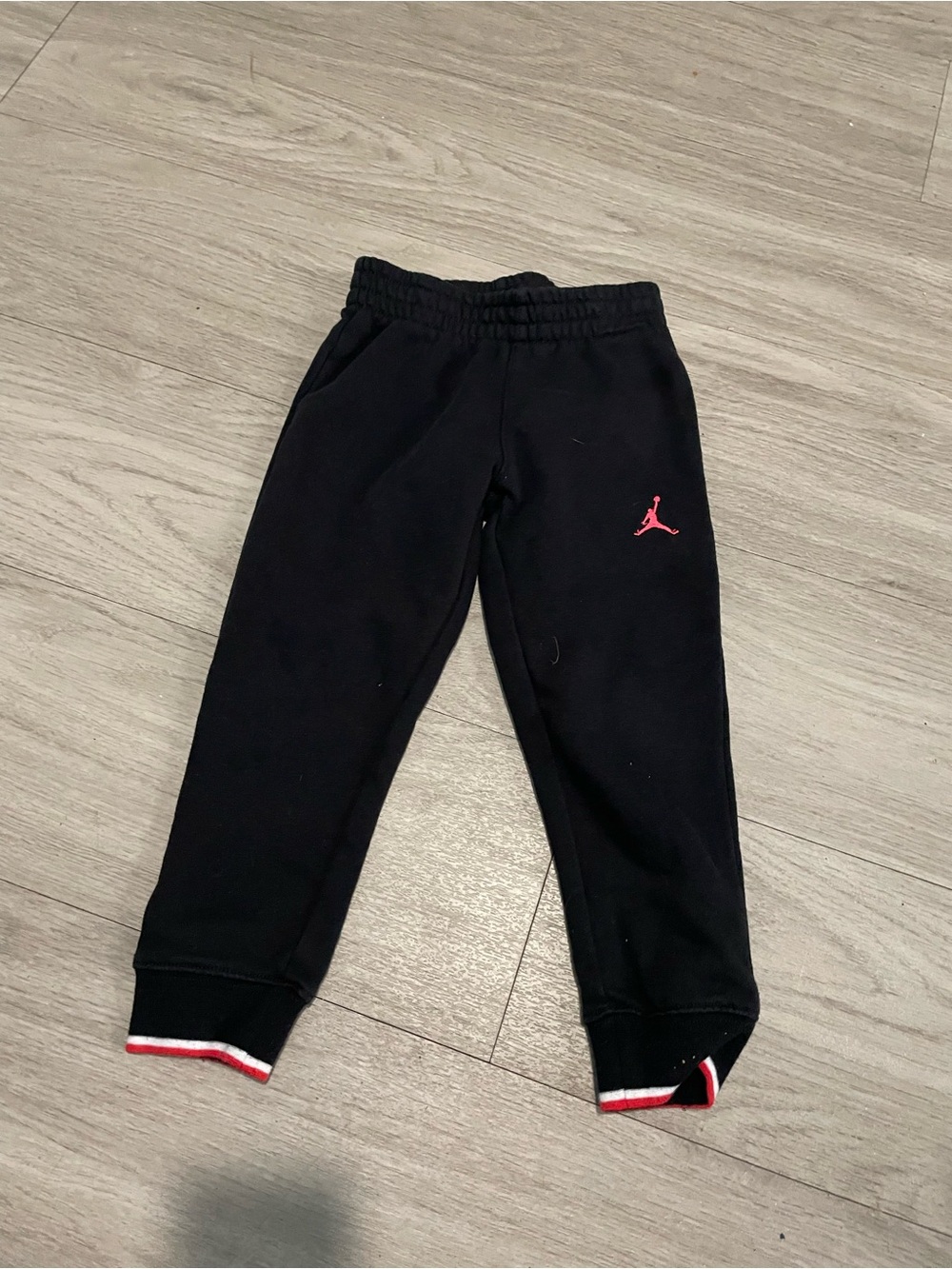 Jordan Black Kids Joggers with Red Jumpman and Red-White Cuff Trim